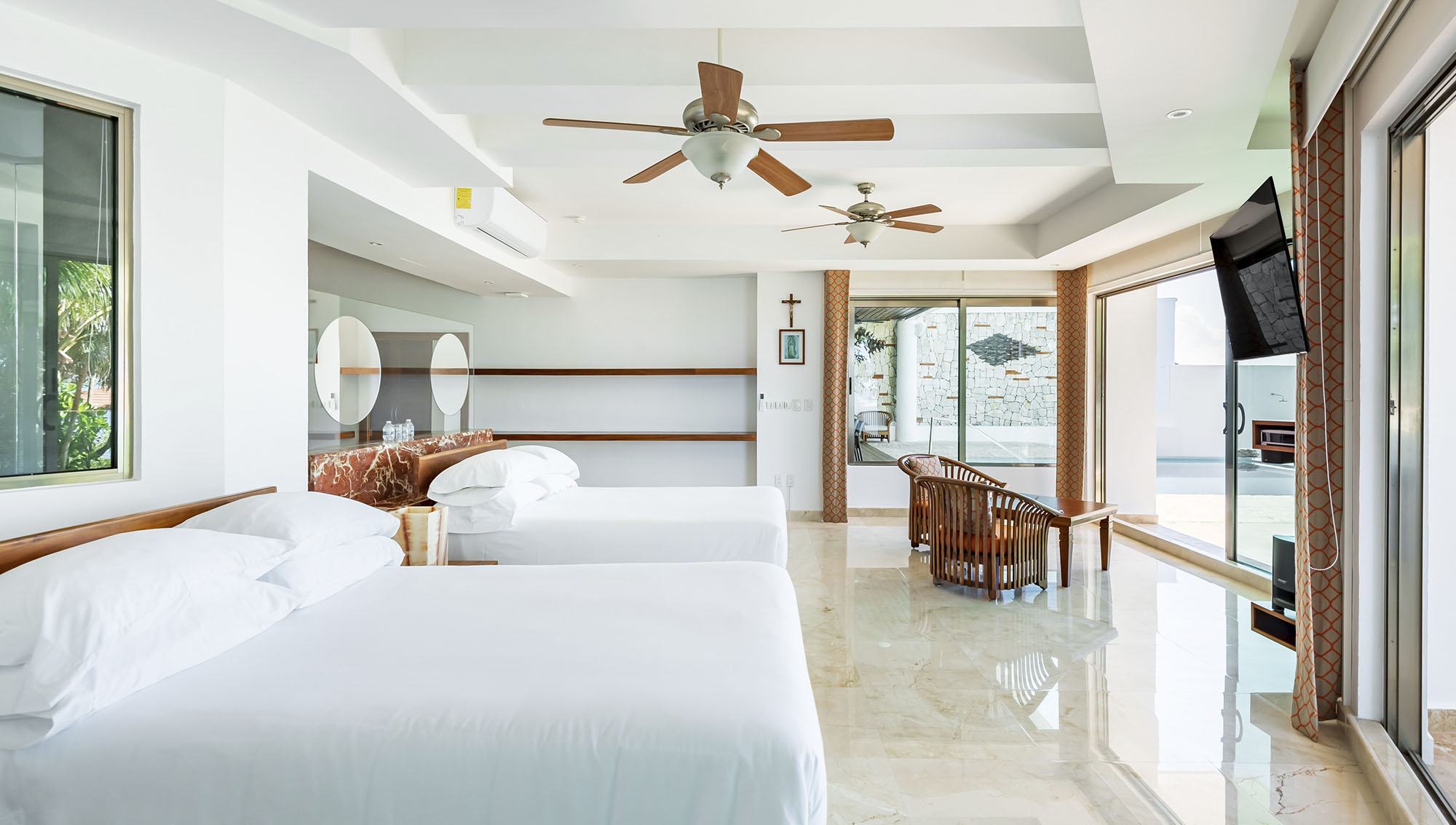Pool Suite steps from the heated infinity pool at Villa Delfines Isla Mujeres