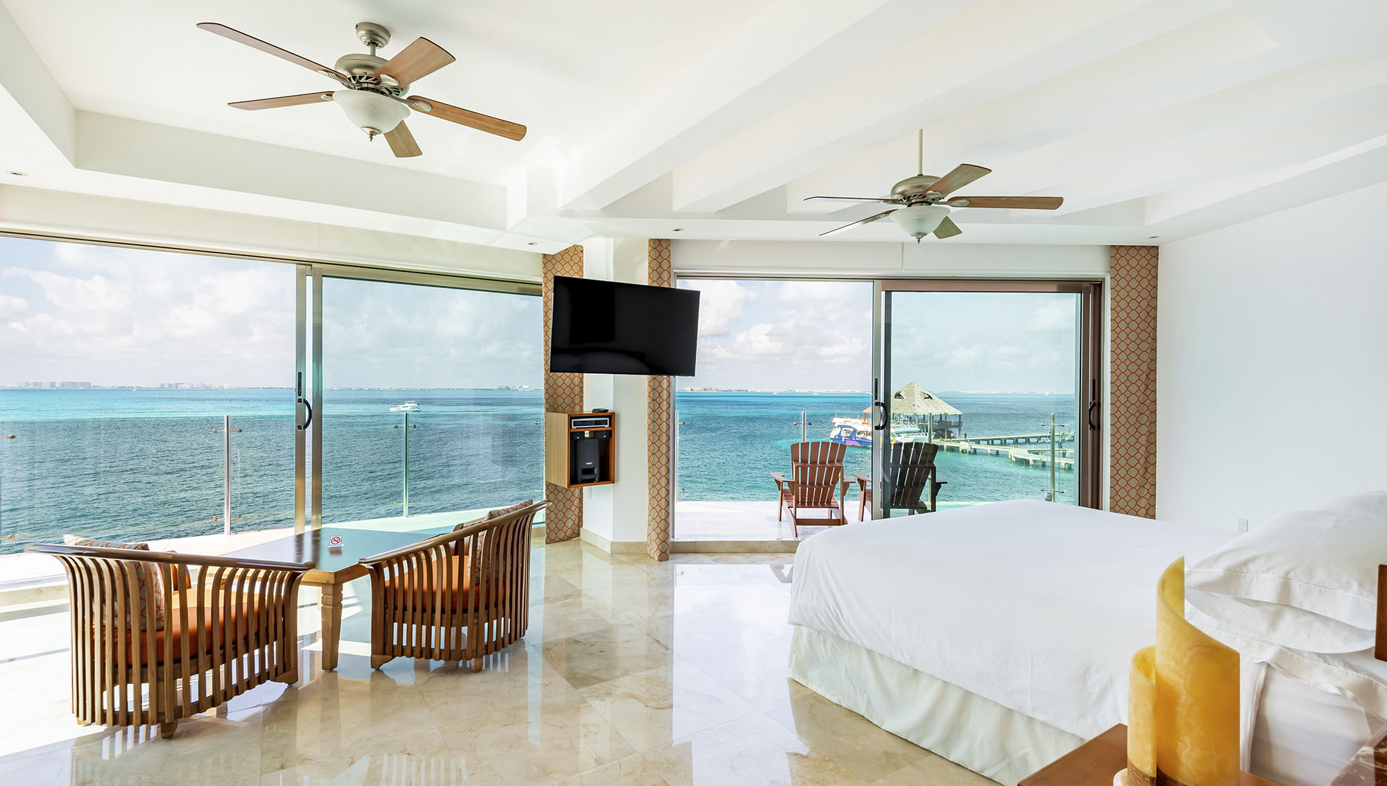 Master Suite with king-size bed and Caribbean Sea view at Villa Delfines Isla Mujeres