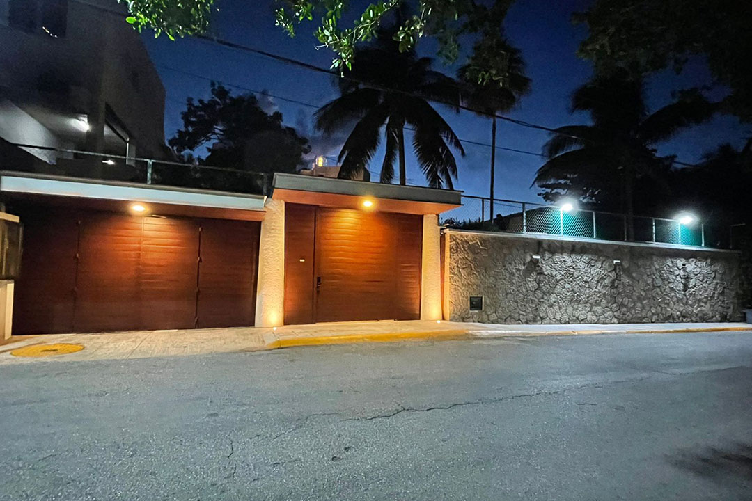 Villa Delfines oceanfront exterior at sunset in Isla Mujeres